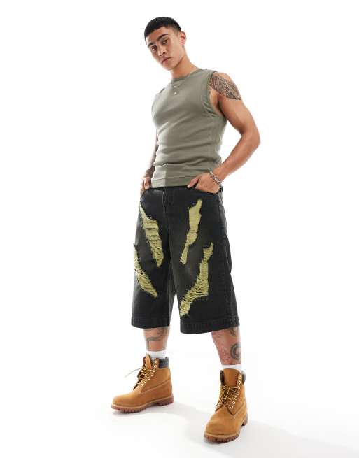ASOS DESIGN - Bermuda long en jean à grosses déchirures - Noir délavé à reflets verts