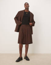 ASOS DESIGN smart wide leg shorts with front pleat in stone