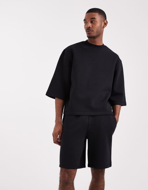 ASOS DESIGN - Bermudas negras extragrandes de punto liso (parte de un conjunto), 3 de 5