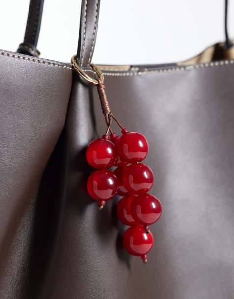 ASOS DESIGN berry bag charm in red - view 1