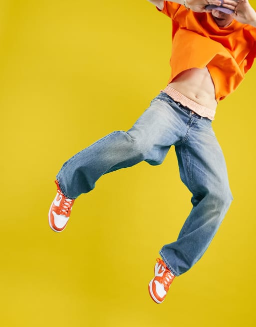 ASOS DESIGN – Besonders weite Jeans in verblichener, japanischer Waschung in Vintage-Mittelblau