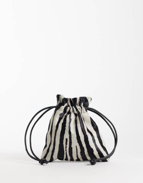 ASOS DESIGN Beuteltasche aus Leder mit Haarstruktur im Zebra-Print - view 1