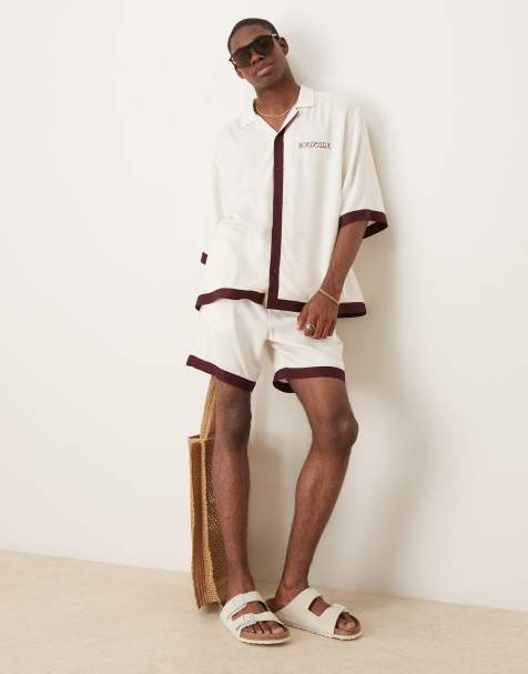 ASOS DESIGN co-ord shorts in mid length with border print in beige