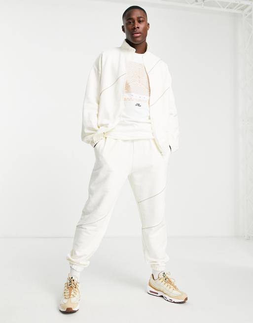 ASOS DESIGN – Beżowe zwężane joggersy oversize z lamówką – część zestawu, 4 z 4