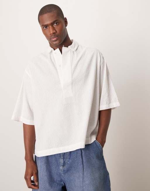 ASOS DESIGN – Biała zakładana przez głowę prześwitująca koszula oversize o pudełkowym kroju z rękawami do połowy długości