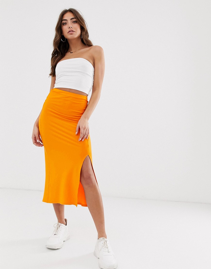 ASOS DESIGN bias cut jersey midi slip skirt with split-Orange