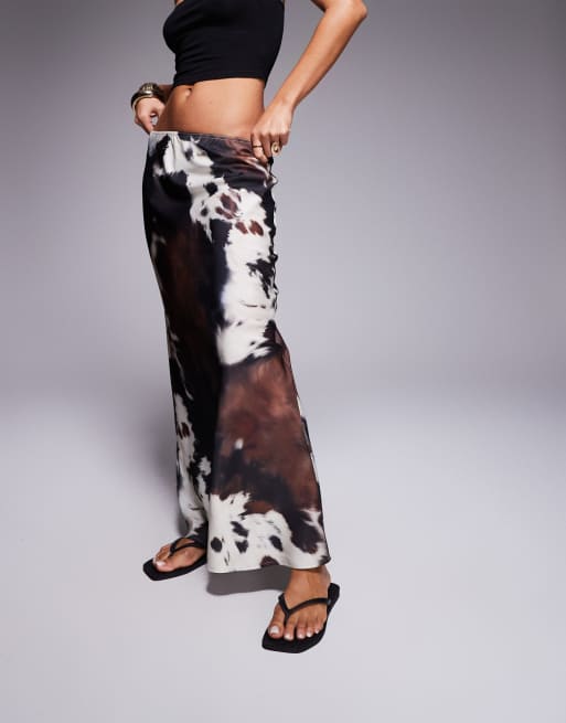 ASOS DESIGN bias cut maxi skirt in cow print