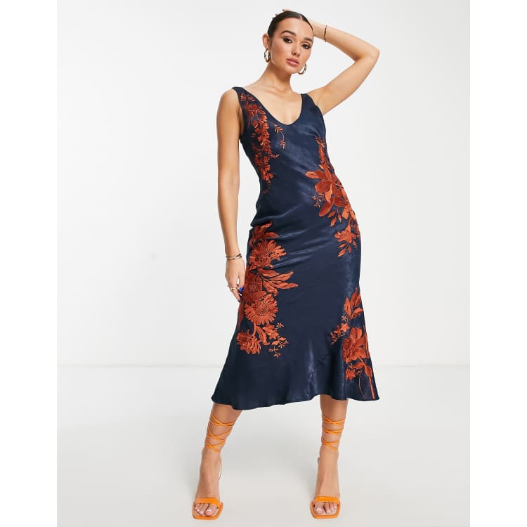asos design bias cut midi satin dress with floral embellishment ASOS DESIGN bias cut midi slip dress in satin with contrast floral  embroidery