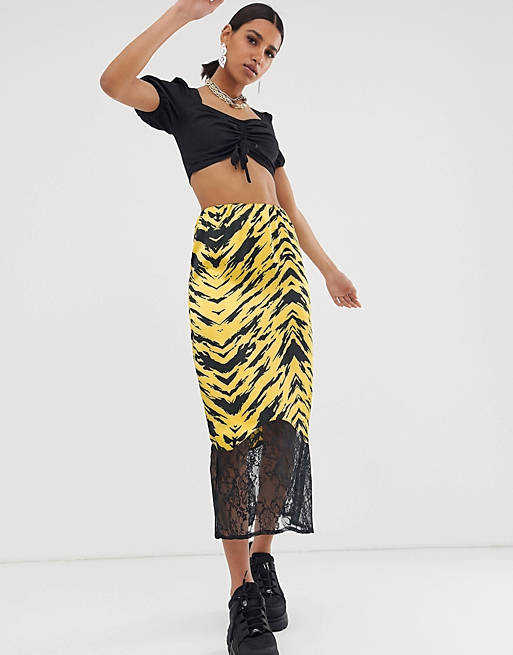 ASOS DESIGN bias cut satin midi slip skirt with lace hem in tiger print