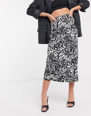 asos design bias cut satin midi skirt in leopard print