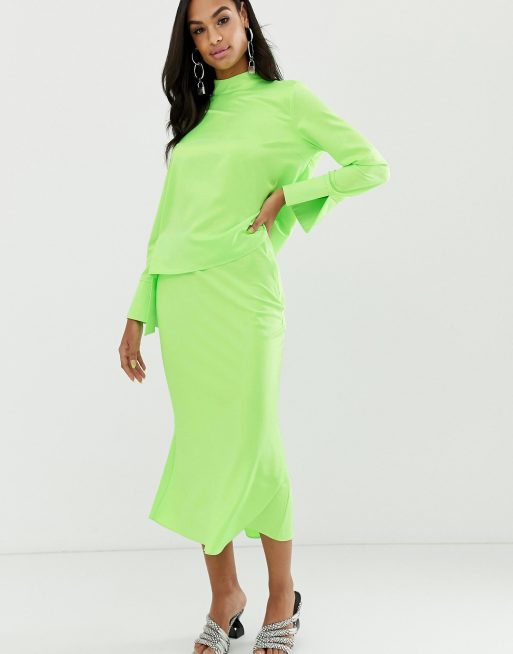 ASOS DESIGN bias cut satin slip midi skirt in neon