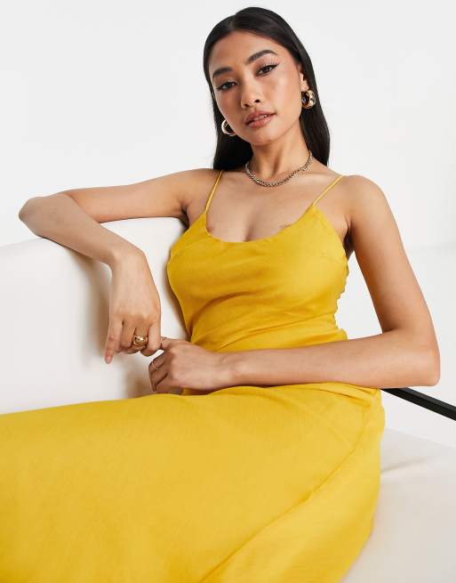 ASOS DESIGN satin bias midi cami slip dress in yellow