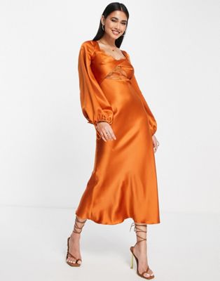 ASOS DESIGN bias satin long sleeve midi dress with delicate lace detail and twist front detail in rust - ASOS Price Checker