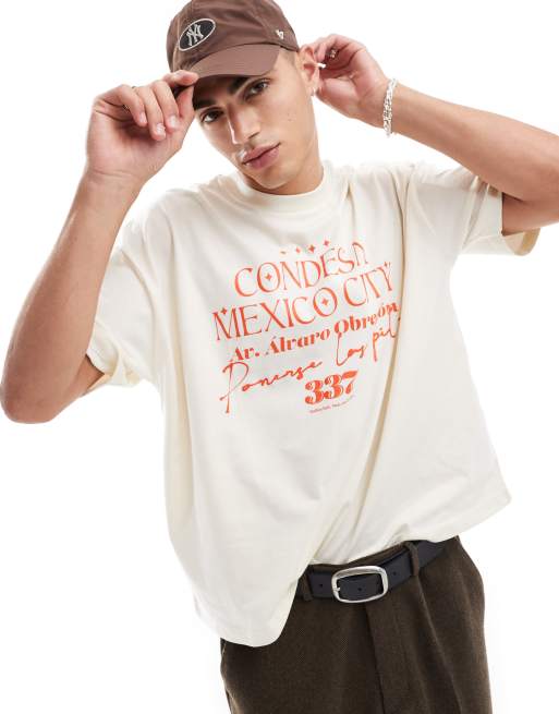 ASOS DESIGN – Biały T-shirt oversize o pudełkowym kroju z nadrukiem z nazwą miasta z przodu