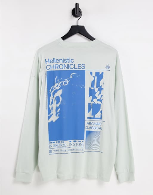 ASOS DESIGN – Biały T-shirt oversize z długimi rękawami i z nadrukiem Statui Wolności w kolorze niebieskim