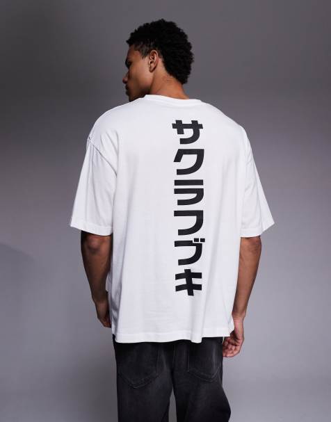 ASOS DESIGN – Biały T-shirt oversize z grafiką na piersi i wzdłuż kręgosłupa - view 1