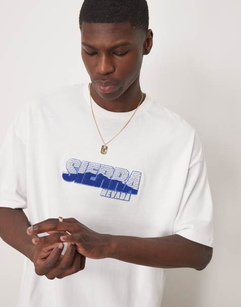 ASOS DESIGN oversized t-shirt with city chest graphic in white