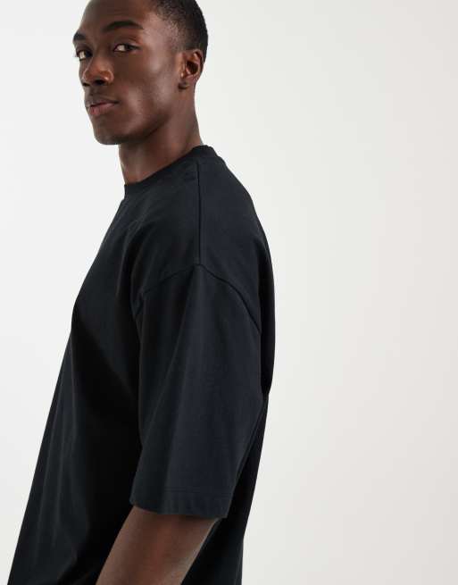 ASOS DESIGN – Biały T-shirt oversize z kwiatową grafiką, 4 z 5