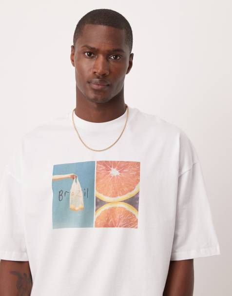 ASOS DESIGN – Biały T-shirt oversize z nadrukiem na piersi - view 1