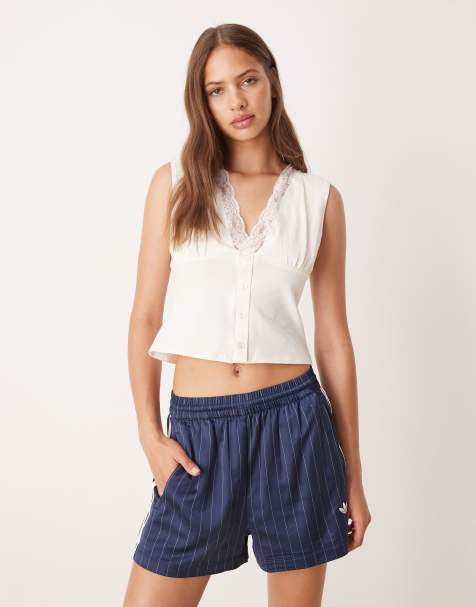 ASOS DESIGN milkmaid plunge button detail top with lace trim in white