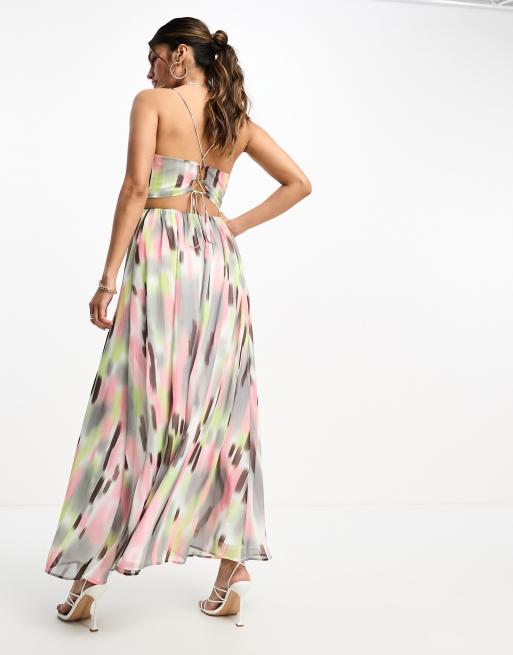 ASOS DESIGN bikini top cutout maxi dress with tie detail in blurred multi print ASOS