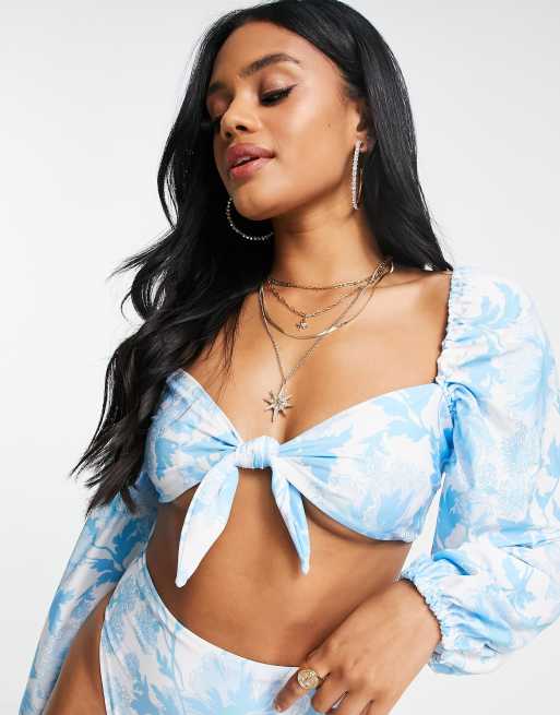 ASOS DESIGN - Bikinitopje met lange mouwen en gestrikte voorkant in blauwe bloemenprint