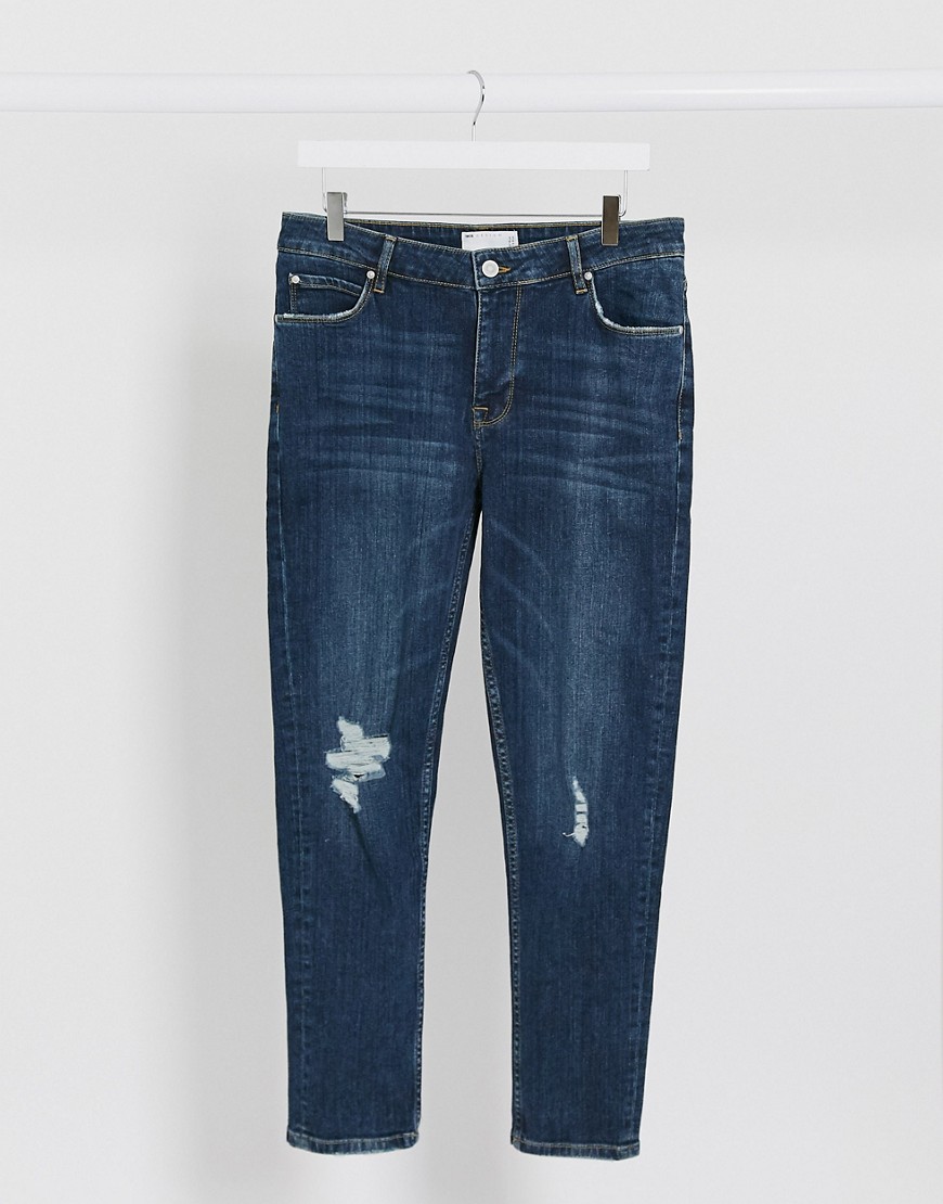 ASOS DESIGN – Blå ankellånga skinny jeans i mörk tvätt med revor på knäna