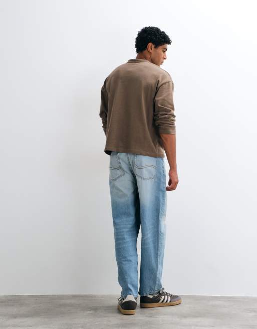 ASOS DESIGN – Blå, avsmalnande jeans i ljus tvätt med avslappnad passform, 4 av 5
