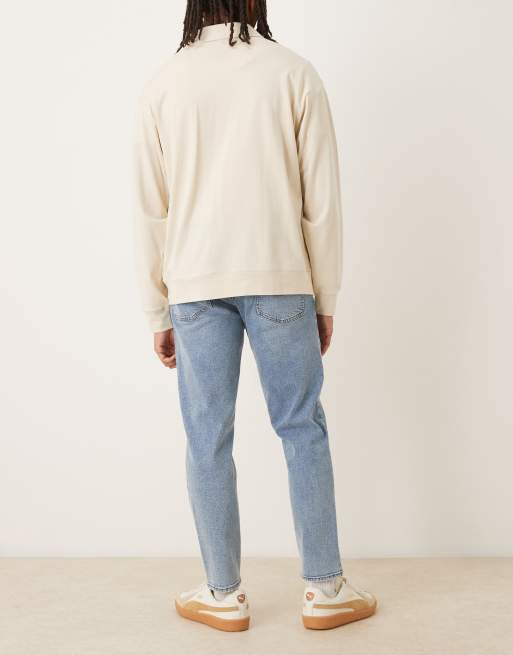 ASOS DESIGN – Blå, avsmalnande jeans med stretch och mellanljus tvätt, 2 av 5