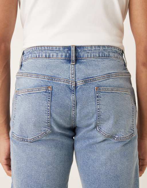 ASOS DESIGN – Blå, avsmalnande jeans med stretch och mellanljus tvätt, 4 av 5