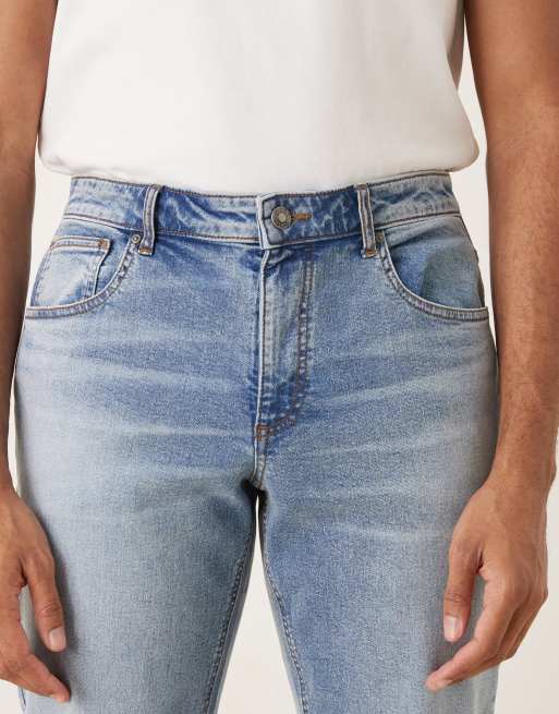 ASOS DESIGN – Blå, avsmalnande jeans med stretch och mellanljus tvätt, 5 av 5