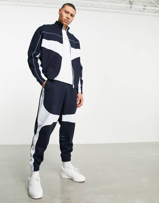 ASOS DESIGN – Blå, blockfärgade mjukisbyxor i oversize, del av set