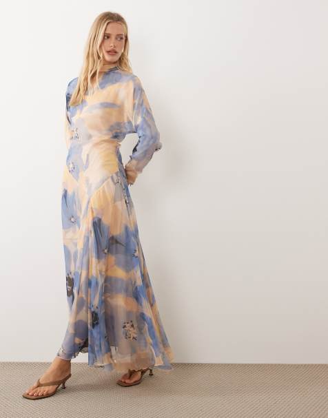 ASOS DESIGN – Blå, blommig maxiklänning med hög krage och asymmetrisk midja - view 1