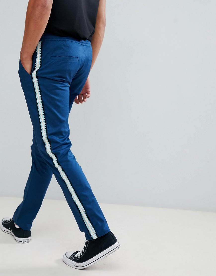ASOS DESIGN – Blå byxor med revärer och smal passform