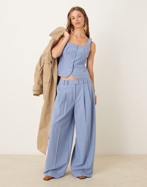 ASOS DESIGN – Blå, figursydda kostymbyxor med låg midja, supervida ben och veck - view 1