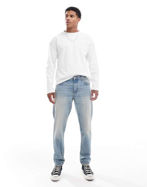 ASOS DESIGN - Blå, mellemvaskede og tapered jeans - view 1