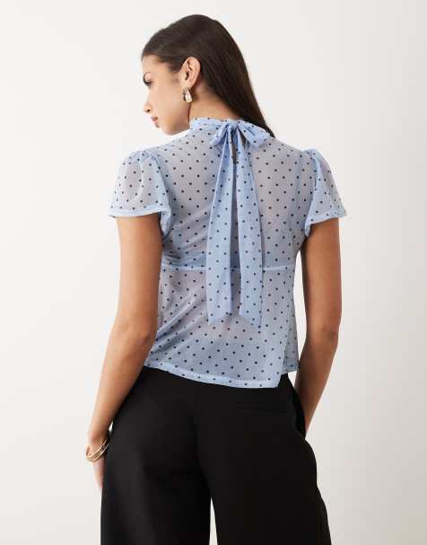 ASOS DESIGN – Blå, prickig topp i mesh med volym, utsvängda ärmar och knytning baktill - view 1