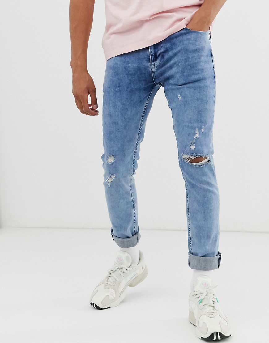 ASOS DESIGN – Blå skinny jeans med revor på knäna