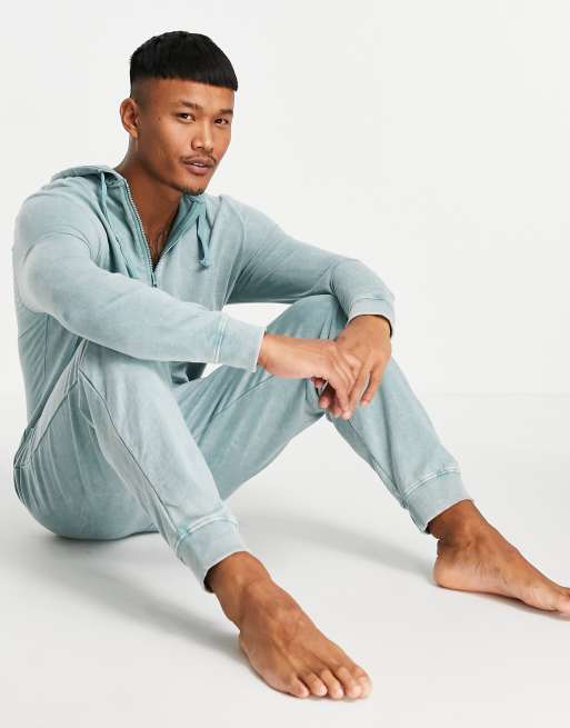 ASOS DESIGN – Blå stentvättad mys-onesie