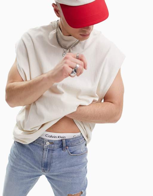 ASOS DESIGN – Blå, stentvättade spray on-jeans med powerstretch och revor på knät, 4 av 4