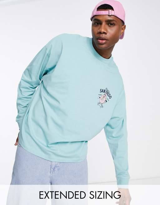 ASOS DESIGN – Blå t-shirt i oversize med lång ärm och tecknad donut baktill, 2 av 4