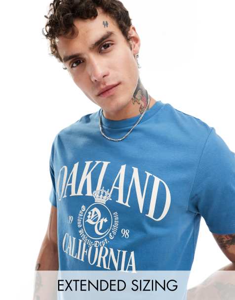 ASOS DESIGN – Blå t-shirt med stadstryck - view 1