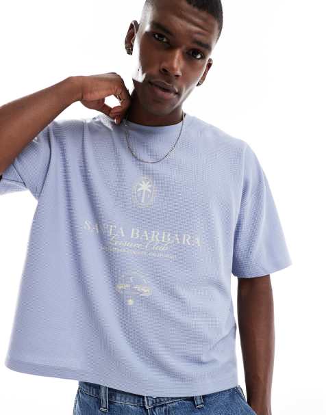 ASOS DESIGN – Blå, våfflad, kraftig t-shirt i oversize med boxig passform, sänkt axelsöm och stadstryck - view 1