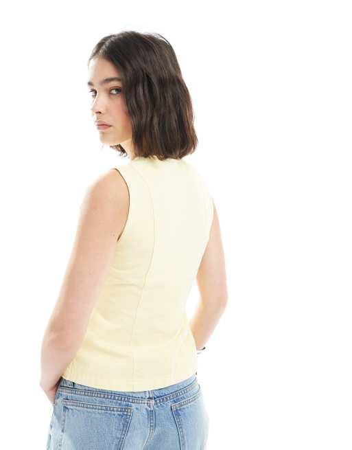 ASOS DESIGN – Bladożółta jeansowa kamizelka z baskinką, 4 z 4