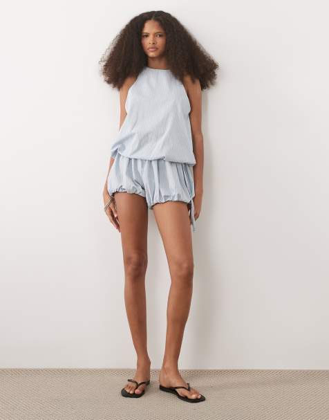 ASOS DESIGN – Blårutigt set med topp med halterneck och ballongfåll - view 1