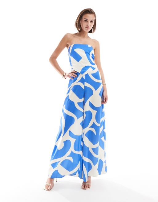  ASOS DESIGN - Blåt jumpsuit med bandeau-snit, tørklæde- og spændedetaljer og abstrakt print