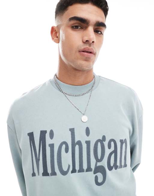 ASOS DESIGN – Blekblå sweatshirt i oversize med texttryck