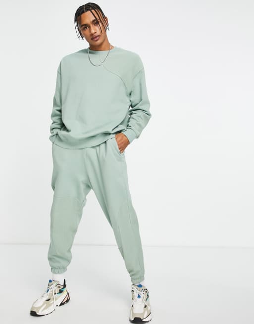 ASOS DESIGN – Blekgröna, ribbade mjukisbyxor i oversize med vågiga paneler, del av set