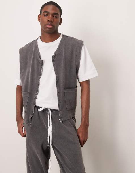 ASOS DESIGN – Bleksvart, boxig och lätt väst i oversize med ribbad textur - view 1