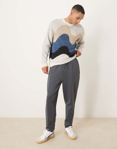 ASOS DESIGN – Bleksvarta, avsmalnande mjukisbyxor i scubamaterial med stråveck - view 1